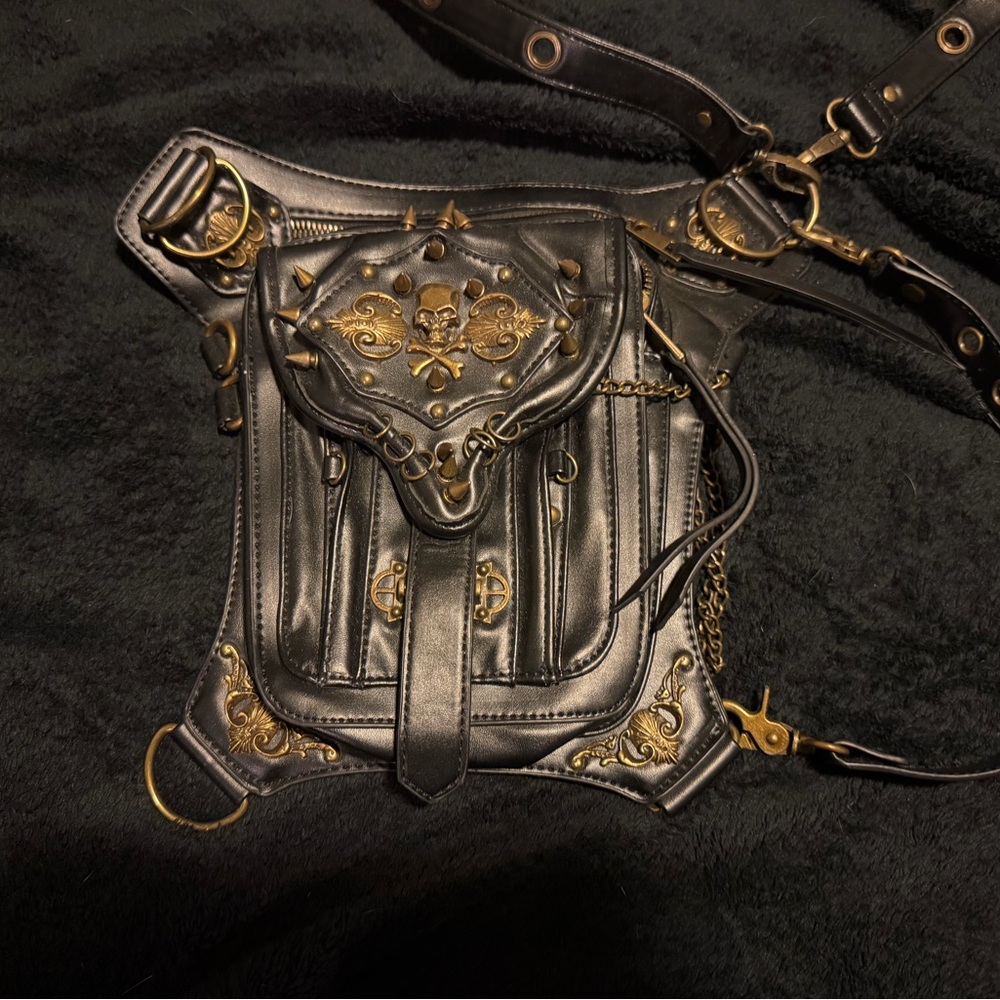 Black Shoulder Bag with Gold Embellishments